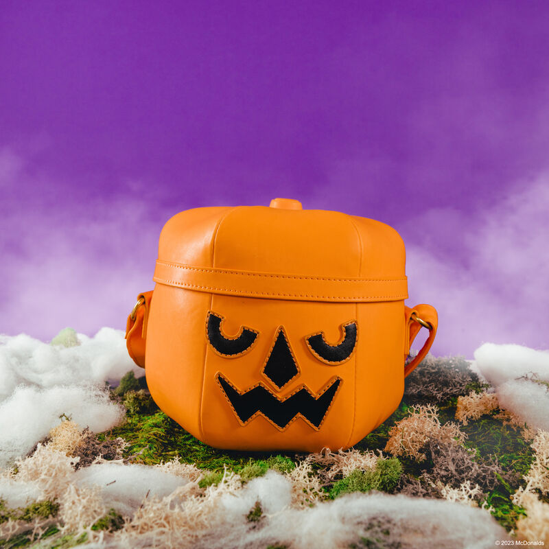 Image of our McDonald's McPunk'n Crossbody Bag against a purple background with fog